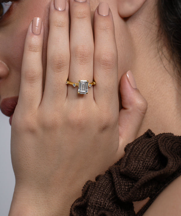 Emerald Cut Solitaire Ring with Dainty Accents
