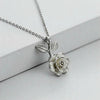 silver-toned rose pendant necklace