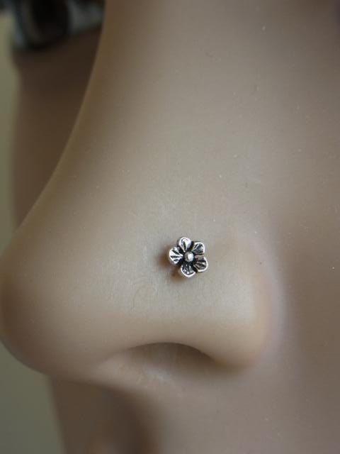 a sterling silver oxidized flower nosepin