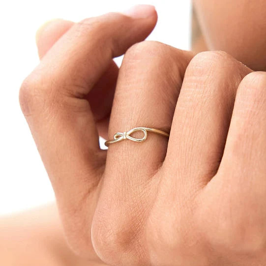 Minimal Knotted Loop Ring