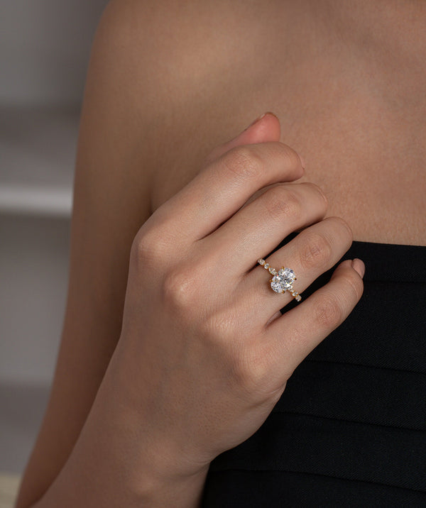 Oval Solitaire & Marquise Vine Ring