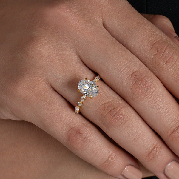 Oval Solitaire & Marquise Vine Ring