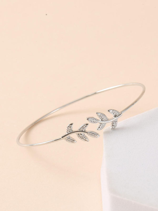 leaf motif adorned with small clear stones