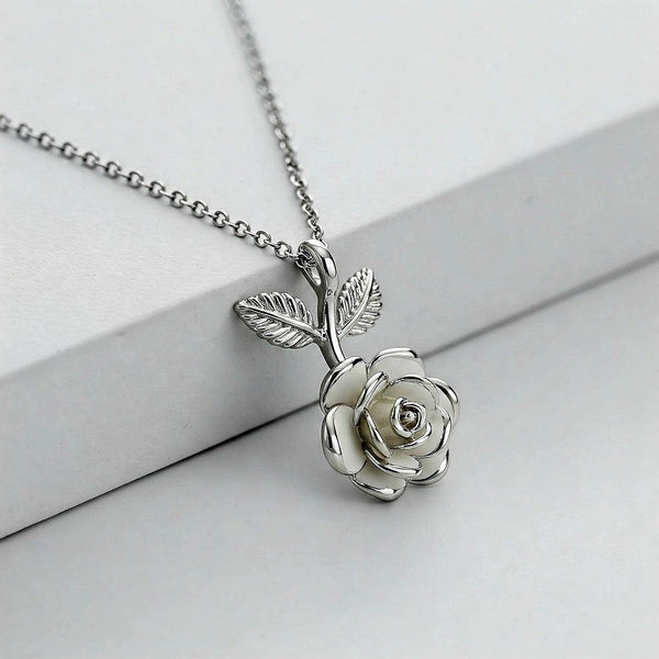 silver-toned rose pendant necklace